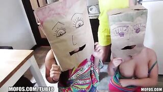 Two girls wear bags on their heads and have sex with guys in an orgy