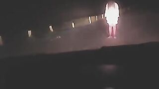 A sexy woman was exercising outdoors when a strange figure appeared, leading to an unexpected intimate encounter