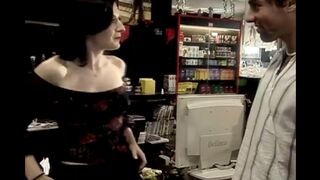 The girl is having fun with a client at her workplace