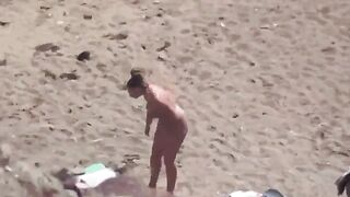 A pair of passionate lovers, naked, enjoy intimate moments at sea