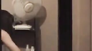 A hot guy admires himself naked in the mirror