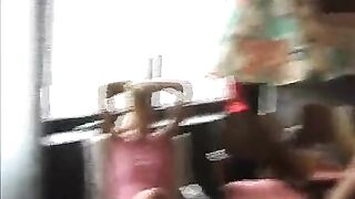 Peeping under the skirt of a young girl