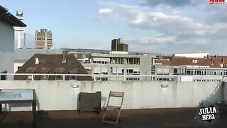 Brunette with big tits bounces on the roof in HD POV