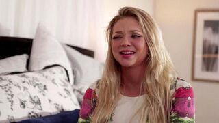 A beautiful lesbian couple having fun directly in bed