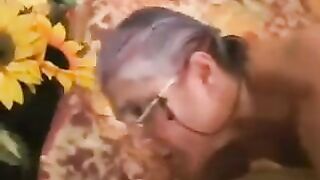The man fucked a gray-haired woman in black stockings