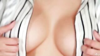 A breast of art from a beautiful brunette