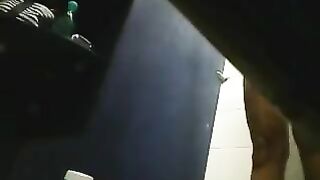 There is a hidden camera in the shower and it films a girl
