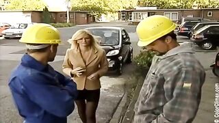 Girl in black pantyhose makes a blowjob on the porn set