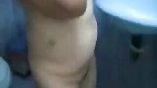A son-in-law peeps at his naked mother-in-law while she’s taking a bath
