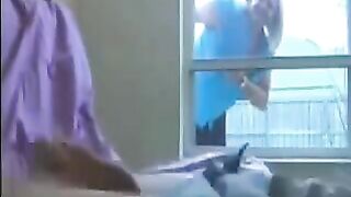 A woman peeps at a guy jerking off in the ward