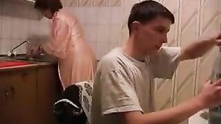 The cooking is doing the raped mom in the kitchen very badly