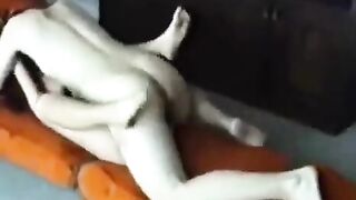 A married couple enjoy intimate moments at their home
