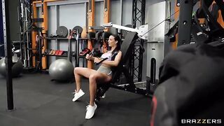 The girl is having fun with her friend in the gym