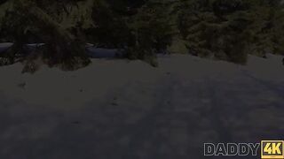 A hot chick is having fun with a guy on the sled by the fireplace