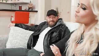 A naughty woman fucks for money on the couch with high heels