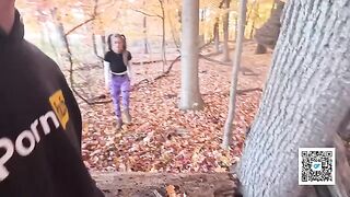A couple enjoys a romantic walk and outdoor intimacy in the park