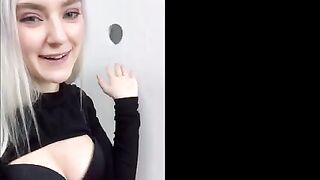 Young beauty got a cumshot on her face while fitting in the store through the glory hole