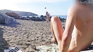 Two girls got caught for wanking on a nude beach