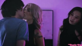 An Asian girl and a blonde in a threesome