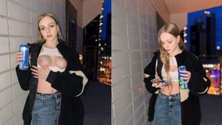 The cute girl showed more than her boobs for the energy drink advertisement