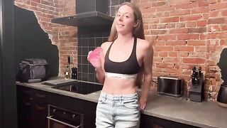 A beautiful woman has sex with her boyfriend in the kitchen