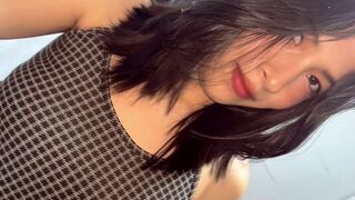 This petite Asian beauty is ready to get naked and enjoy herself