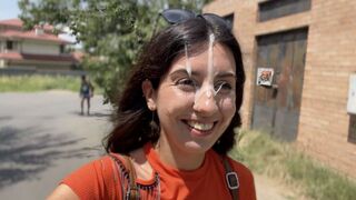 A huge cum shot on the girl’s face during a risky outdoor activity
