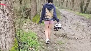 A cute petite girl is fucking in the woods, right on the forest floor