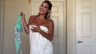 She gets rid of her clothes as easily as you would get rid of a wrapper from a candy bar