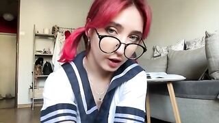 A girl with porn-star boobs masturbates, exploring her body