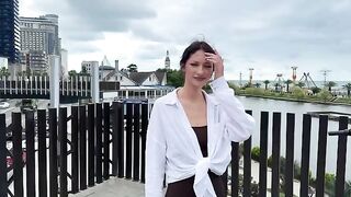 A signal of distress from a stunning young woman at the Bikini Atoll
