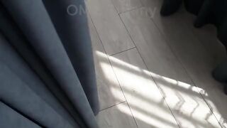 A cute girl rubs her pussy sliding on the sheet