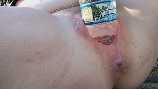 A woman reached a peak of pleasure while indulging in self-pleasure outdoors