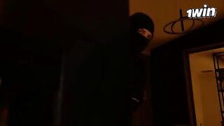 The busty housewife was fucked by a masked burglar in doggy style
