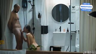 A couple enjoys a passionate and intimate moment in the shower, exploring every sensation