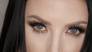 Angela White is double penetrated in an intense threesome scene