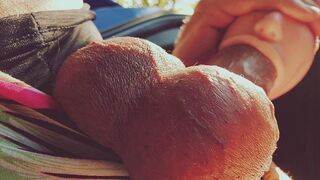 A girl with a silicone mouth works outdoors and gets paid