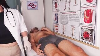 The doctor conducts an oral examination with intense thoroughness