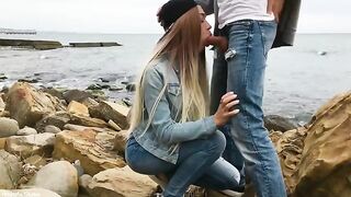 A hot blondie gives a skilled blowjob to her lover outdoors
